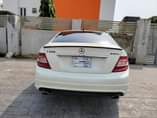 A picture of Registered white C300 2009 model Buy and drive Full option