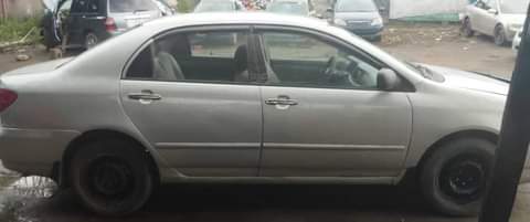 A picture of PRICE 2 8M BUYER SETTLE AGENT 100K TOYOTA COROLLA 2003
