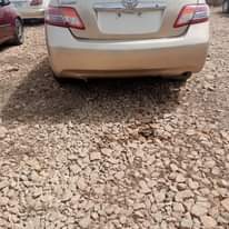A picture of NEATLY USED 2010 CAMRY WITH COMPLETE ORIGINAL PAPERS AC PERFECTLY