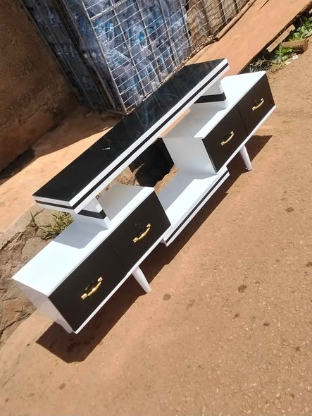 A picture of 6feet tv stand at 300k with free delivery within kampala