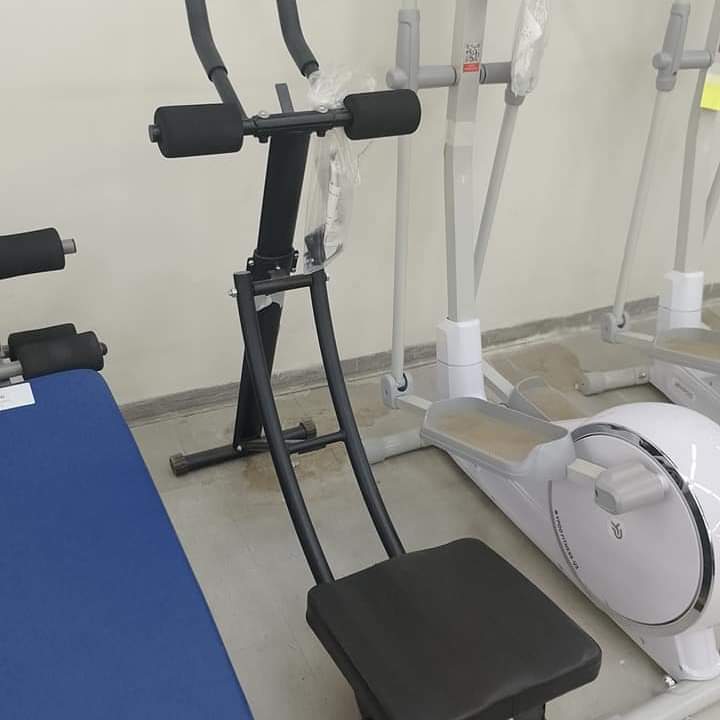 A picture of Gym equipments and dumbbells