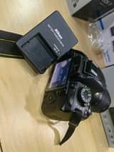 A picture of Nikon D3100 with 18 55mm lens