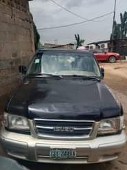 A picture of Isuzu jeep for sale engine and gear is ok..The car