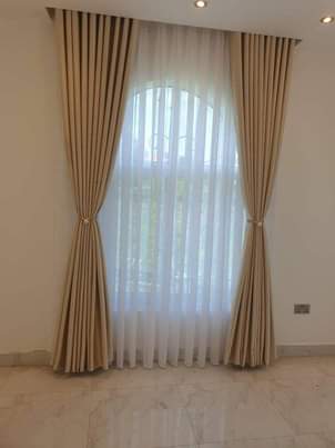A picture of Curtains rods and nets 0703836818 0776763178.