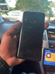 A picture of Samsung galaxy A10s gb32 clean cleck ndogo kwenye mfuniko kwa