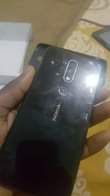 A picture of Phones and converter on sale