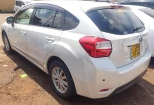 A picture of SUBARU IMPREEZA UBQ PRICE 32M WSTUP0759539100 CALL0776717226