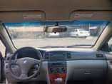 A picture of Neatly Registered painted 2006 Toyota Corolla LE buy and travel