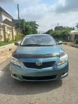 A picture of well baked Corolla with 2009 untempered engine and gear Price