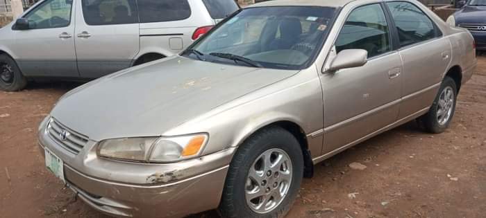 A picture of Clean Nigerian Used Toyota Camry tiny light Fabric interior Sound