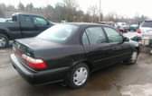 A picture of Sharp Direct tokunbo Toyota Corolla 97 A C chilling Sound