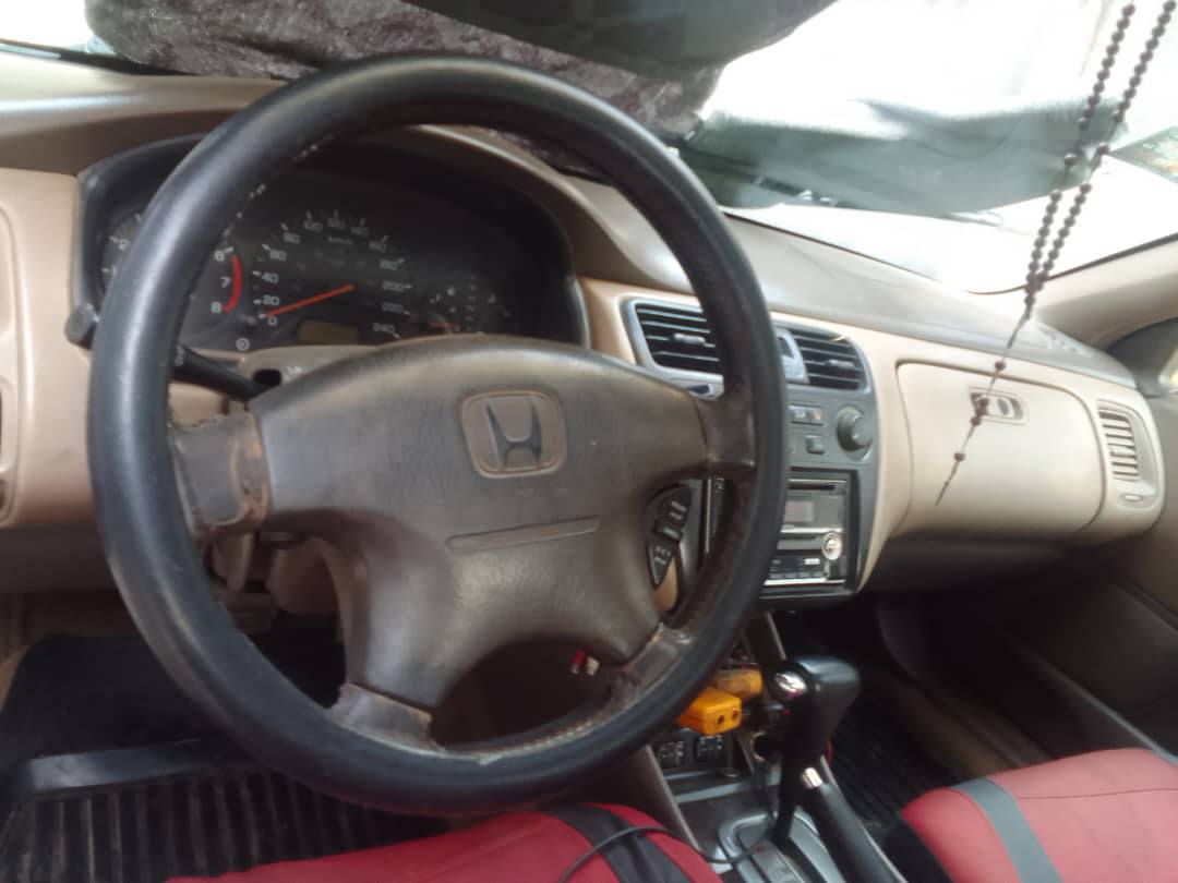 A picture of Honda Accord 2002 model in perfect condition engine and gear