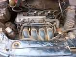 A picture of RAV4 for sale engine and gear is ok Ac needs
