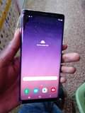 A picture of Samsung note 8 dual sim cracked but functional 64gb 6gb