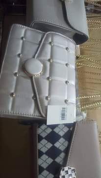 A picture of Bags clutches and back pack