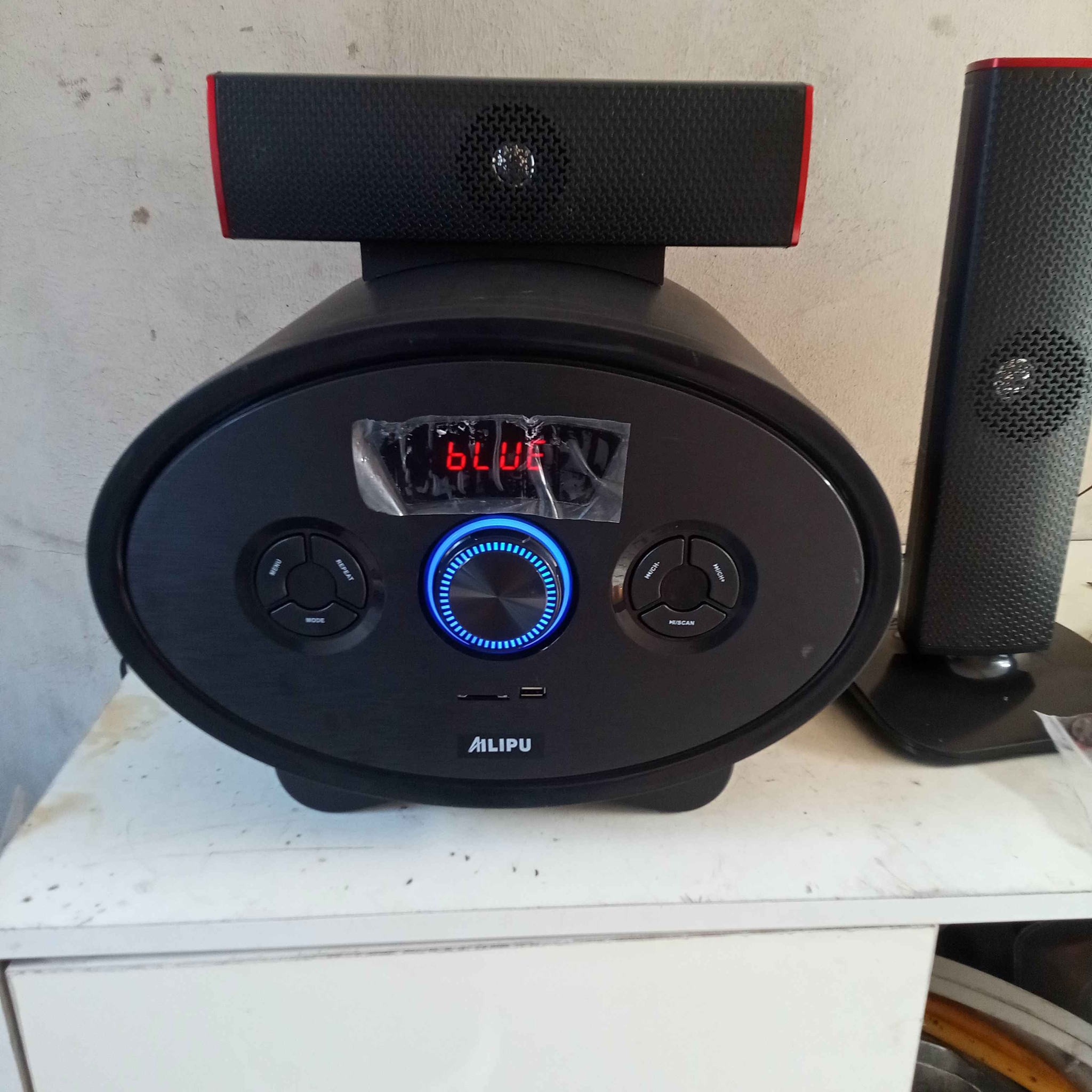 A picture of ALIPU 3.1 subwoofer. 3.1 Channel HOME THEATER SYSTEM