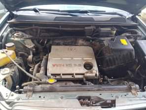A picture of Toyota Camry aka spider model 08 engine gear and A