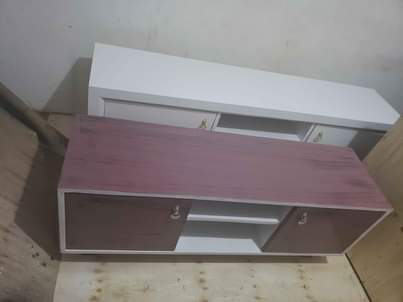 A picture of Kitchen cabinet Tsh 100 000 Showcase tv Tsh 260 000