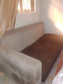 A picture of 3 seaters sofa and CAMON 11