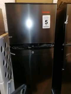 A picture of Changchong 260 litre fridge and TCL 55 inch LED UHD