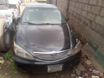 A picture of TOYOTA CAMRY XLE MODEL 2004 LOCATION IKOTUN ENGINE INTACT GEAR