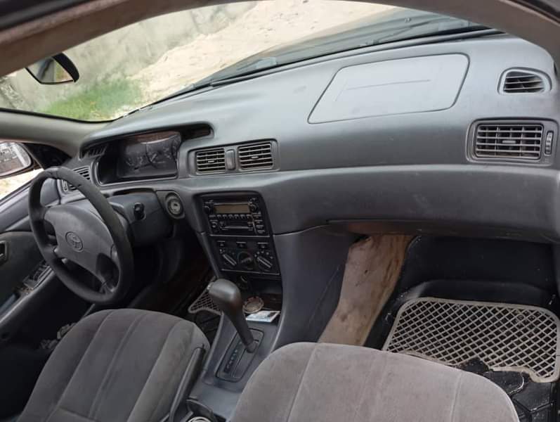 A picture of Toyota Camry with silent Engine and smooth Gear transmission Pure