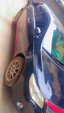 A picture of Toyota Corolla 2011 model. Owner needs money urgently and nothing