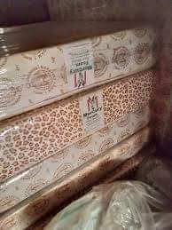 A picture of Sleeping beds and 2 pillow case