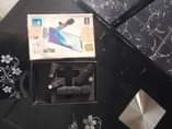 A picture of Tripod and Lavalier microphone