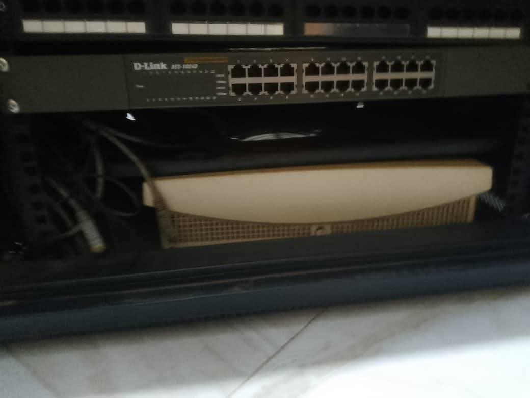 A picture of Am selling a rack 24 port switch and a Panasonic
