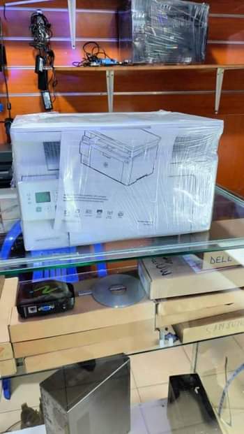 A picture of Multifunctional Printers. They can Scan print and photocopy