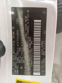 A picture of Distress foreign used 2016 Toyota highlander xle White on black
