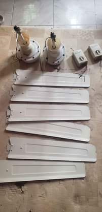 A picture of 2 Neatly used Newclime ceiling fan big coil