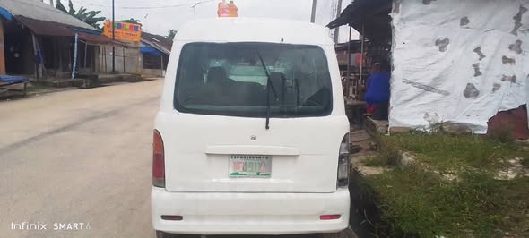 A picture of Very sound hijet Keke bus with belt engine
