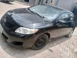 A picture of 2010 Corolla with silent engine sharp gear and chilling ac