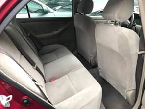 A picture of Features 2005 Wine Corolla CE 1 8l i4 engine Automatic
