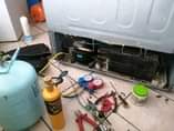 A picture of We fix broken electronic devices Tvs microwave plasma washing machine