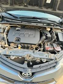 A picture of 2014 Toks Toyota Corolla. First body AC mortuary standard