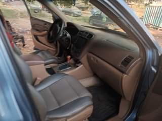 A picture of Relocation Sale 04 Acura MDX Jeep For Sale Abuja. Untempered