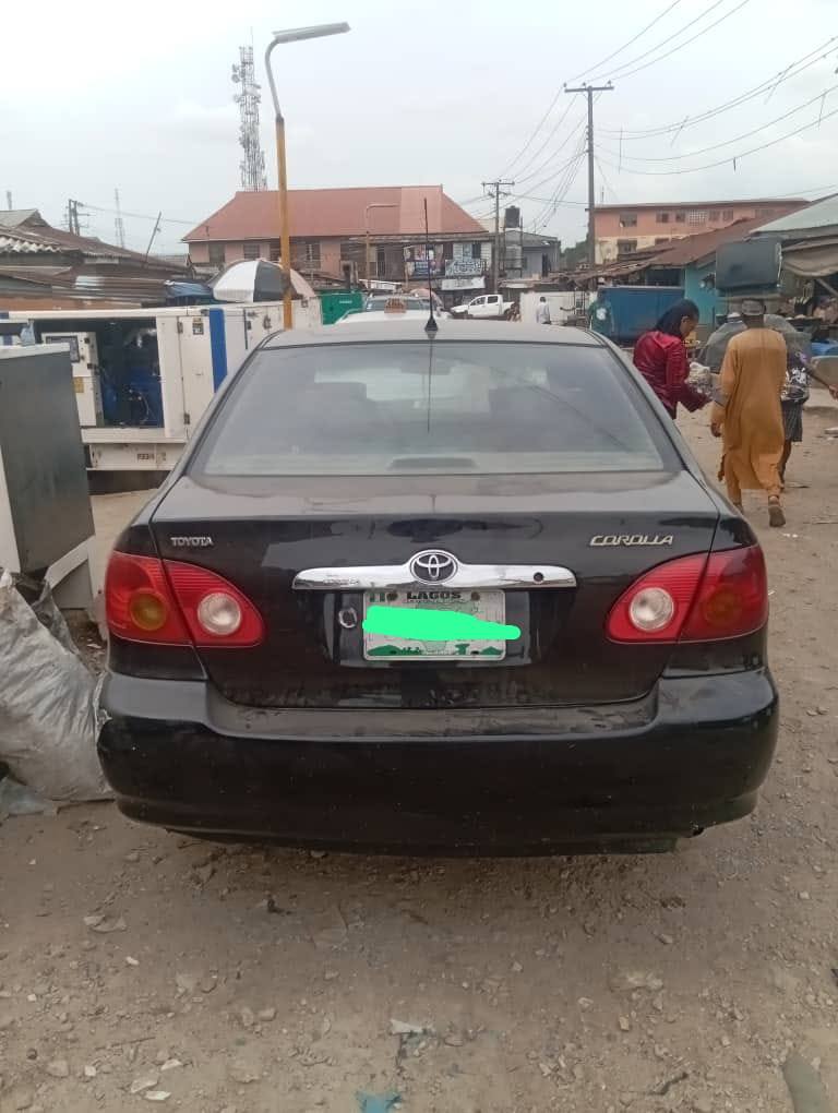 A picture of Toyota Corolla Nigeria used buy and drive location Ago palace
