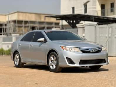 A picture of SUPER CLEAN SLIGHTLY USED UNREGISTERED 2014 TOYOTA CAMRY 7 5M