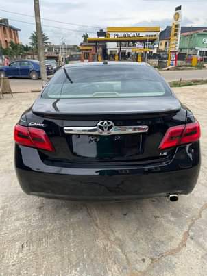 A picture of V clean toks standard 2010 Toyota Camry 4 plugs engine