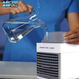 A picture of AIR COOLER KAMA AC Unaweka maji Zinatoa baridi kama AC