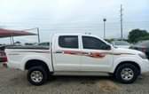 A picture of 2013 Toyota hilux manual transmission extremely clean Nigeria used bought
