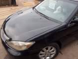 A picture of 2003 TOYOTA CAMARY BLACK