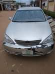 A picture of Toyota Camry 2004 registered features engine needs change of oil