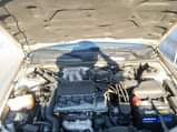 A picture of 1998 Toyota Camry LE Gold factory AC first body sound