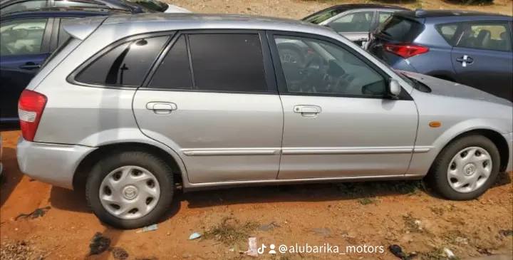 A picture of Direct Tokunbo Mazda 323f with factory filted a c with