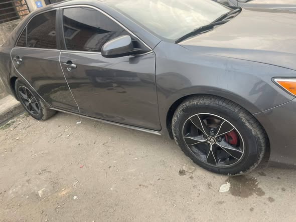 A picture of REGISTERED REGISTERED 2014 TOYOTA CAMRY LE CLEAN RIDE AS U