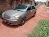 A picture of Neatly used Toyota corrola Buy And Drive First body Everything
